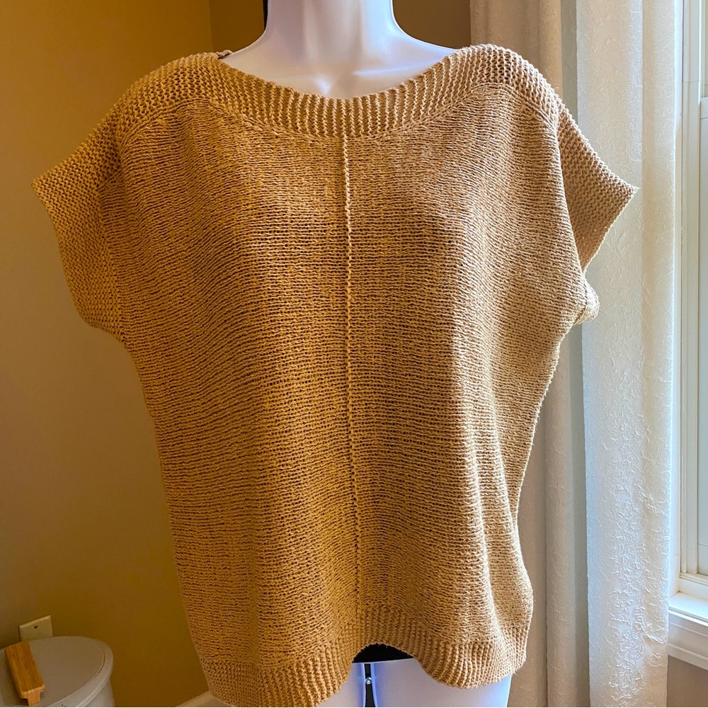 Tan sleeveless sweater. Size Medium